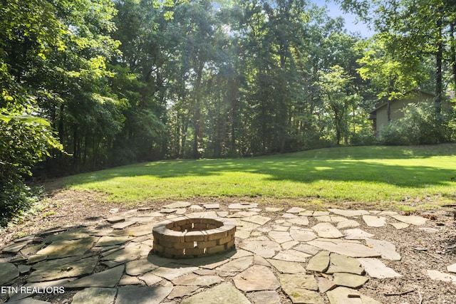 11424 Gates Mill Dr, Knoxville, TN 37934 - view of green lawn featuring a fire pit and a patio area