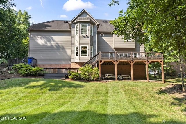 11424 Gates Mill Dr, Knoxville, TN 37934 - rear view of house featuring a deck, a yard, and roof with shingles