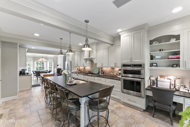 11424 Gates Mill Dr, Knoxville, TN 37934 - kitchen with dark countertops, stainless steel appliances, stone tile flooring, decorative backsplash, and ornamental molding