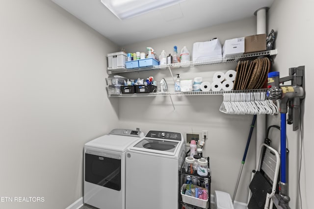 11424 Gates Mill Dr, Knoxville, TN 37934 - laundry area featuring washer and dryer and baseboards
