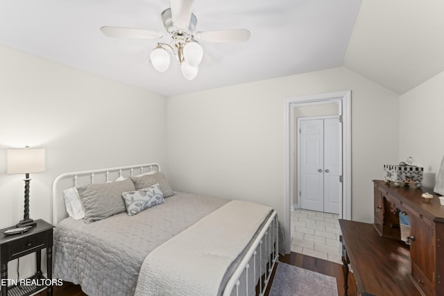 11424 Gates Mill Dr, Knoxville, TN 37934 - bedroom with dark wood-type flooring, a ceiling fan, and lofted ceiling