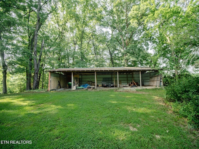 4139 Browder Hollow Rd, Lenoir City, TN 37771 - view of green lawn with a pole building and an outdoor structure