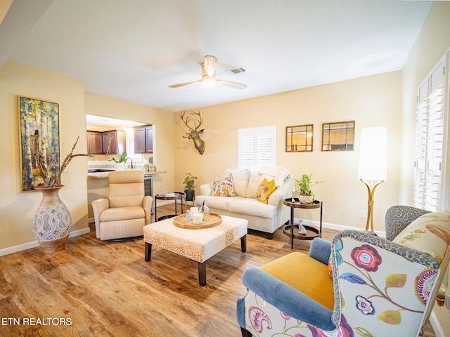 4139 Browder Hollow Rd, Lenoir City, TN 37771 - living area featuring light wood-style floors and a ceiling fan