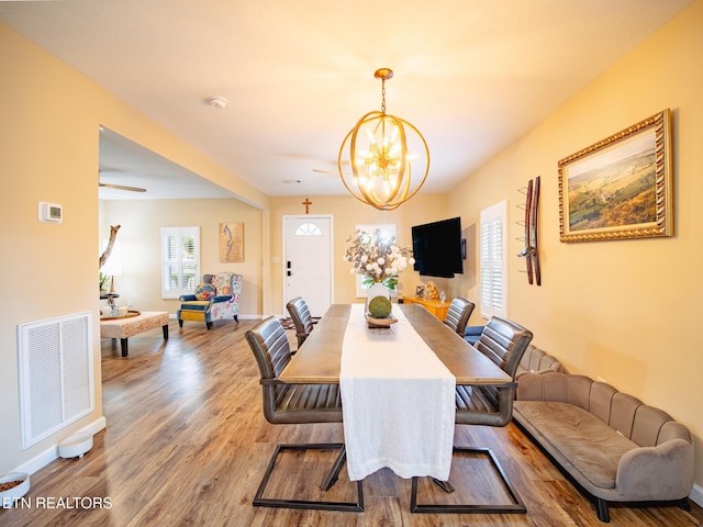 4139 Browder Hollow Rd, Lenoir City, TN 37771 - dining room featuring a chandelier and wood finished floors