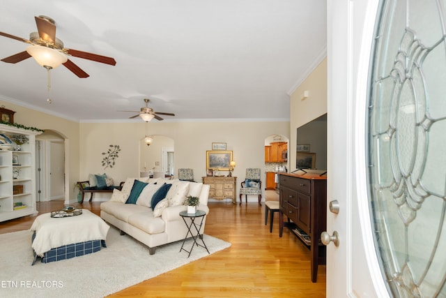 505 Bugaboo Springs Rd, Jonesborough, TN 37659 - living area featuring arched walkways, ceiling fan, light wood-style floors, and crown molding