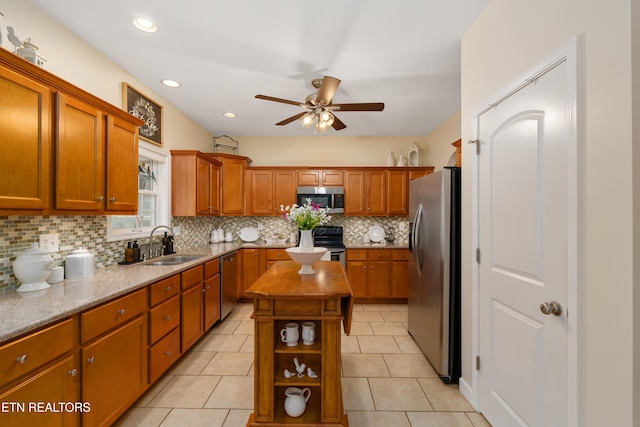 505 Bugaboo Springs Rd, Jonesborough, TN 37659 - kitchen with appliances with stainless steel finishes, ceiling fan, a kitchen island, backsplash, and open shelves