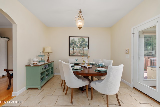 505 Bugaboo Springs Rd, Jonesborough, TN 37659 - dining space with arched walkways, healthy amount of natural light, and light tile patterned floors