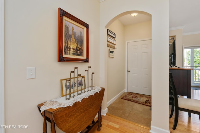 505 Bugaboo Springs Rd, Jonesborough, TN 37659 - foyer entrance with arched walkways, crown molding, and light wood-style floors
