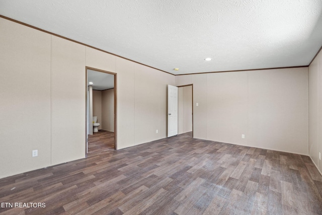 308 Cowan Ln, Lafollette, TN 37766 - empty room featuring wood finished floors, a textured ceiling, and crown molding