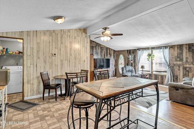 125 Loggers Ln, Clinton, TN 37716 - dining area featuring wooden walls, washer and dryer, ceiling fan, and lofted ceiling