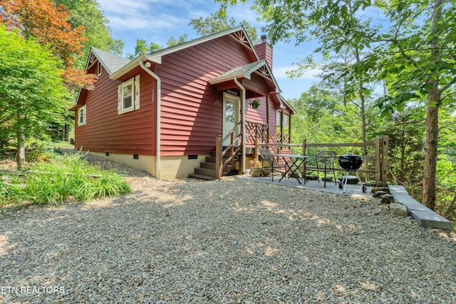 132 Cutter Gap Rd, Townsend, TN 37882 - view of front facade with crawl space and a chimney