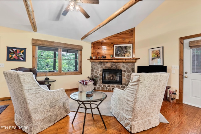 132 Cutter Gap Rd, Townsend, TN 37882 - living area with lofted ceiling, wood finished floors, a stone fireplace, and ceiling fan