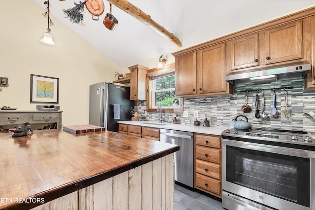 132 Cutter Gap Rd, Townsend, TN 37882 - kitchen featuring appliances with stainless steel finishes, under cabinet range hood, wood counters, tasteful backsplash, and high vaulted ceiling