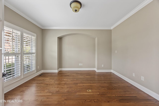 1219 Barton Place Ln, Knoxville, TN 37922 - unfurnished room with crown molding, wood finished floors, and arched walkways