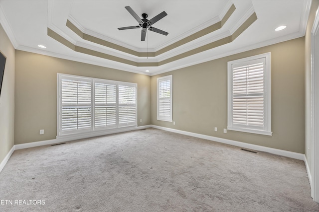 1219 Barton Place Ln, Knoxville, TN 37922 - spare room featuring crown molding, a tray ceiling, carpet flooring, a ceiling fan, and recessed lighting