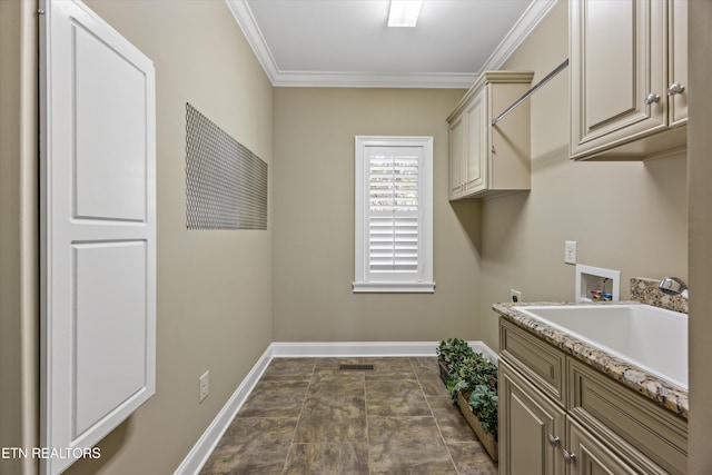 1219 Barton Place Ln, Knoxville, TN 37922 - laundry area featuring hookup for a washing machine, cabinet space, electric dryer hookup, ornamental molding, and stone finish flooring