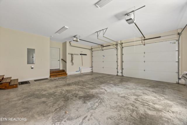 1219 Barton Place Ln, Knoxville, TN 37922 - garage with electric panel and a garage door opener