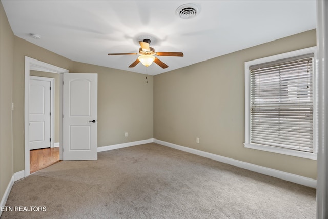 1219 Barton Place Ln, Knoxville, TN 37922 - carpeted empty room featuring ceiling fan and a smoke detector