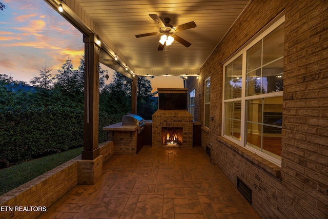 1219 Barton Place Ln, Knoxville, TN 37922 - view of patio / terrace with an outdoor brick fireplace, a ceiling fan, and exterior kitchen