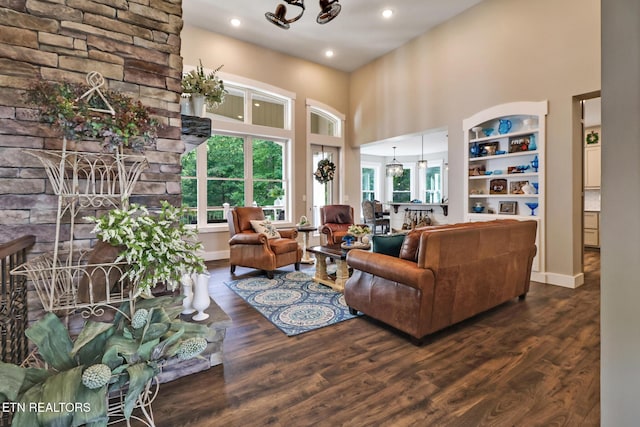 265 Falling Leaf Rd, Jamestown, TN 38556 - living area featuring a towering ceiling, wood finished floors, a chandelier, and recessed lighting