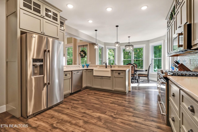 265 Falling Leaf Rd, Jamestown, TN 38556 - kitchen with appliances with stainless steel finishes, a peninsula, plenty of natural light, light countertops, and recessed lighting