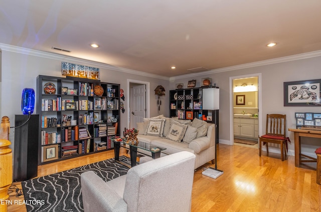 1155 Evelyn Mae Way, Knoxville, TN 37923 - living room with wood finished floors, crown molding, and recessed lighting
