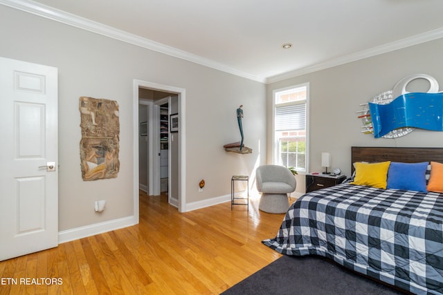 1155 Evelyn Mae Way, Knoxville, TN 37923 - bedroom with ornamental molding, wood finished floors, and a spacious closet