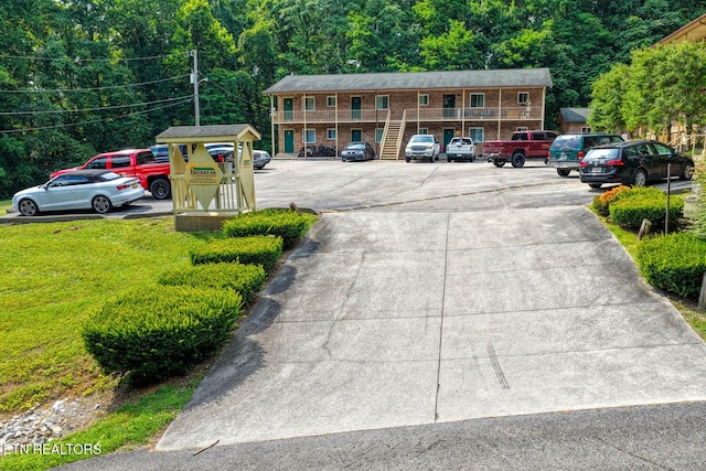 2810 Daybreak Way, Strawberry Plains, TN 37871 - uncovered parking lot featuring stairs