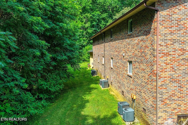 2810 Daybreak Way, Strawberry Plains, TN 37871 - view of home's exterior with a lawn and brick siding