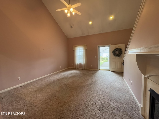 101 Pear Tree Ln, Loudon, TN 37774 - unfurnished living room with high vaulted ceiling, a ceiling fan, carpet floors, recessed lighting, and a fireplace