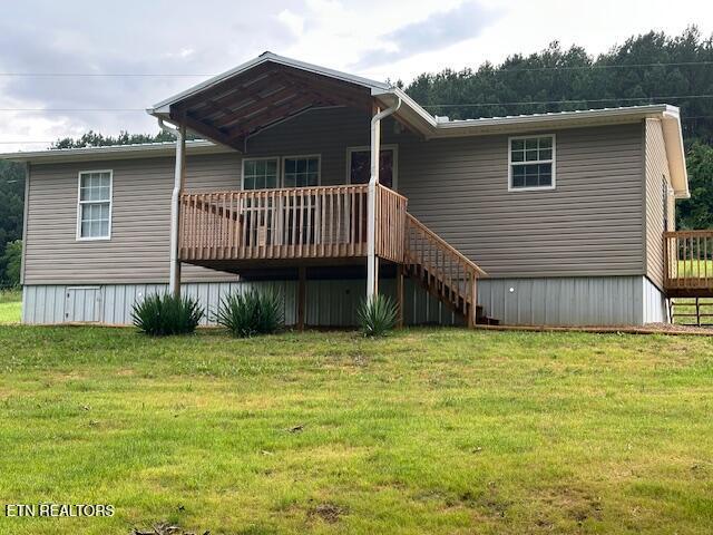167 Loftis Rd, Parrottsville, TN 37843 - back of house featuring a deck, a yard, and stairway