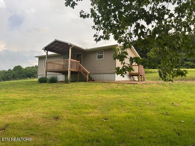 167 Loftis Rd, Parrottsville, TN 37843 - rear view of property with a yard, a deck, and stairs