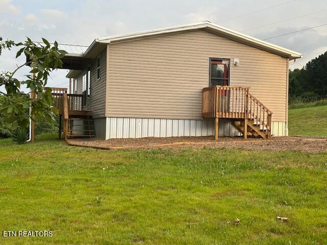 167 Loftis Rd, Parrottsville, TN 37843 - rear view of property with a lawn