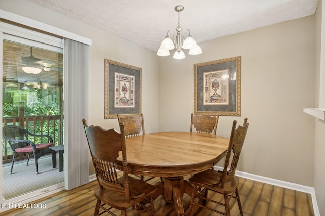 8600 Olde Colony Trl Unit 106, Knoxville, TN 37923 - dining room with a chandelier and dark wood-style flooring