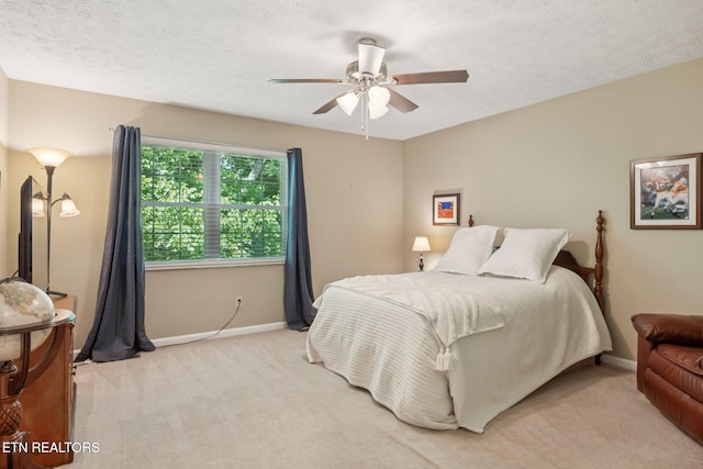 8600 Olde Colony Trl Unit 106, Knoxville, TN 37923 - bedroom with light colored carpet, ceiling fan, and a textured ceiling