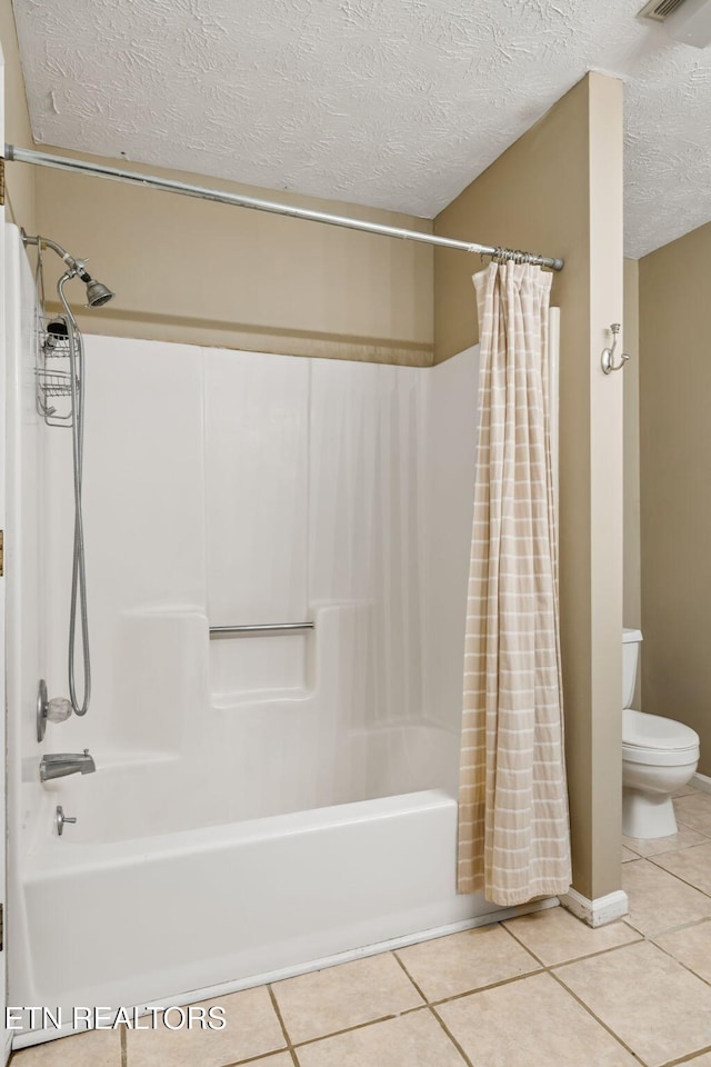 8600 Olde Colony Trl Unit 106, Knoxville, TN 37923 - full bathroom with shower / bathtub combination with curtain, a textured ceiling, and tile patterned flooring