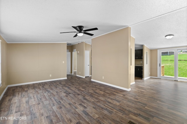 130 Hidden Estates Way, Newport, TN 37821 - unfurnished living room featuring a textured ceiling, dark wood-style flooring, a ceiling fan, and crown molding
