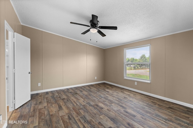 130 Hidden Estates Way, Newport, TN 37821 - unfurnished room with dark wood finished floors, a ceiling fan, ornamental molding, a textured ceiling, and a decorative wall