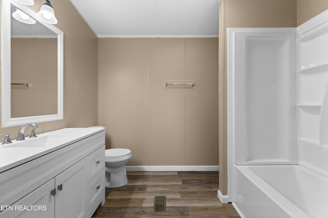 130 Hidden Estates Way, Newport, TN 37821 - full bath with wood finished floors, vanity, a textured ceiling, and  shower combination
