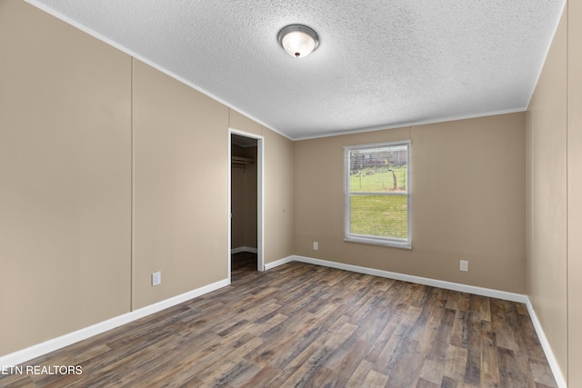 130 Hidden Estates Way, Newport, TN 37821 - unfurnished bedroom with wood finished floors, a textured ceiling, a closet, and ornamental molding