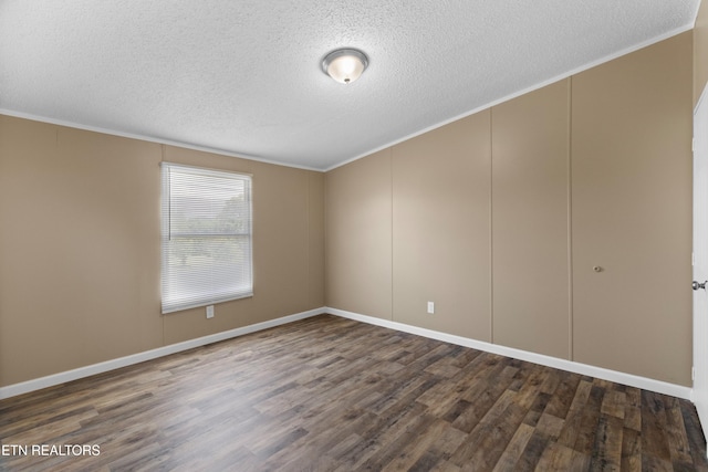 130 Hidden Estates Way, Newport, TN 37821 - unfurnished room featuring dark wood-style floors, a textured ceiling, ornamental molding, and a decorative wall