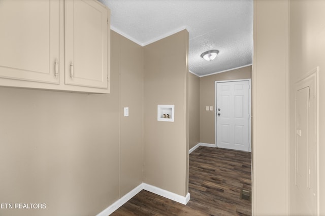 130 Hidden Estates Way, Newport, TN 37821 - laundry area featuring cabinet space, dark wood-style floors, hookup for a washing machine, ornamental molding, and a textured ceiling