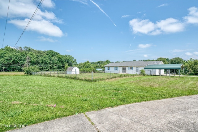 2019 Martha Washington Rd, Clarkrange, TN 38553 - view of yard featuring a carport and an outdoor structure