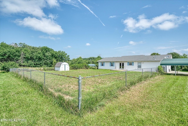 2019 Martha Washington Rd, Clarkrange, TN 38553 - fenced backyard featuring a storage shed and a detached carport