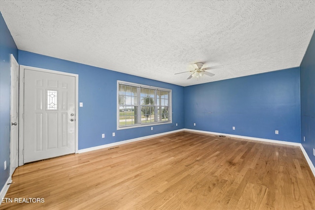 2019 Martha Washington Rd, Clarkrange, TN 38553 - foyer featuring ceiling fan, wood finished floors, and a textured ceiling
