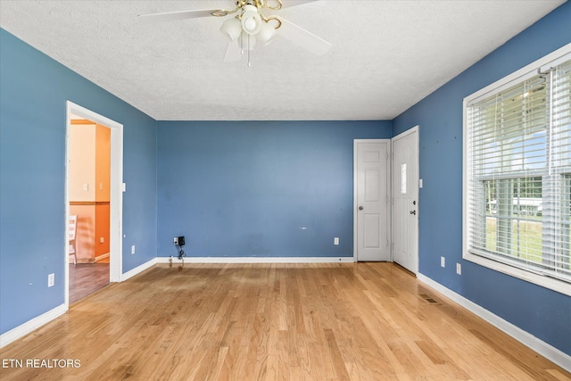 2019 Martha Washington Rd, Clarkrange, TN 38553 - spare room with a ceiling fan, wood finished floors, and a textured ceiling