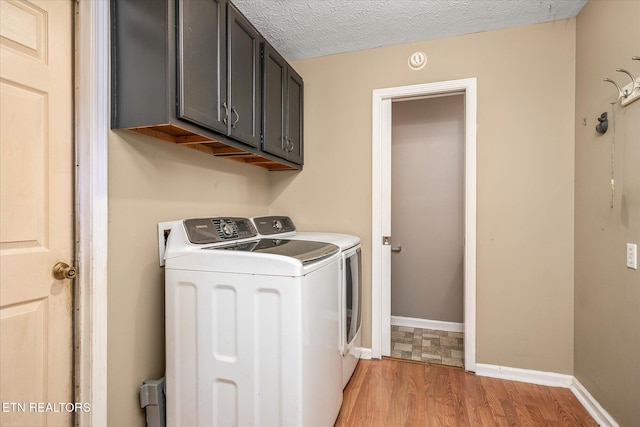 2019 Martha Washington Rd, Clarkrange, TN 38553 - washroom with washer and clothes dryer, cabinet space, and light wood finished floors