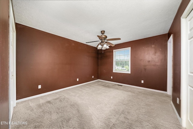 2019 Martha Washington Rd, Clarkrange, TN 38553 - empty room featuring a textured ceiling, ceiling fan, and carpet flooring