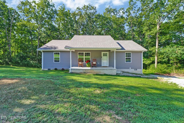 2296 Memory Garden Rd, Jamestown, TN 38556 - view of front of home with a porch, crawl space, a front yard, and a shingled roof