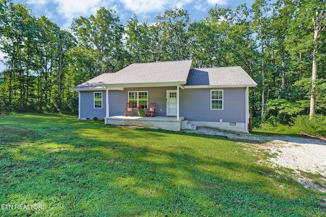 2296 Memory Garden Rd, Jamestown, TN 38556 - single story home featuring crawl space, a front lawn, a porch, and roof with shingles